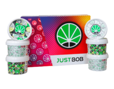 JustBob CBD Gras Kit fruit - Farbiger Hintergrund mit Dosen